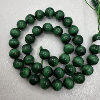 Намистини Малахіт, форма куля
.
Розмір 9,5-10 мм, 40 см 
.
Ціна за нитку