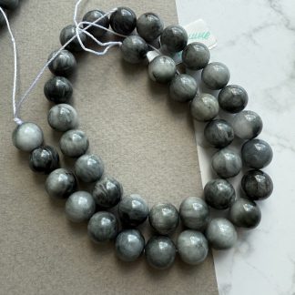 Намистини Соколине Око, форма куля, гладка 
.
Розмір 10 мм, 38 см 
.
Ціна за нитку