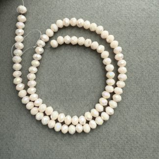 Намистини кришталеві Рондель, розмір 6*4 мм, довжина 38 см, колір молочний з переливом