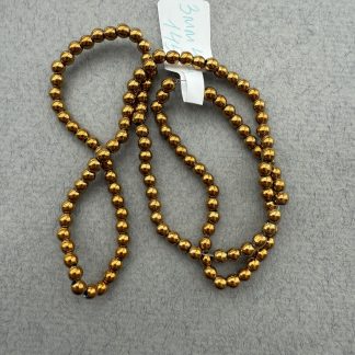 Гематит Куля, відтінок тепле жовте золото 
.
Розмір 3 мм, довжина 40 см 
.
Ціна за нитку