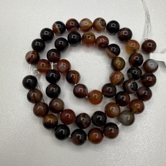 Намистини Онікс, форма куля 
.
Розмір 8 мм, довжина 38 см 
.
Ціна за нитку