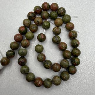 Намистини яшма Унакіт, форма куля. 
Розмір 8 мм, довжина 38 см. 
Ціна 250 грн нитка