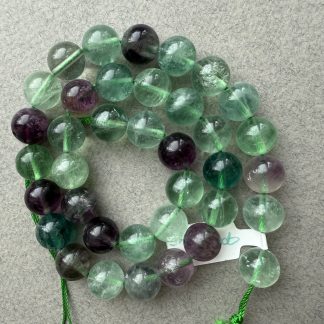 Намистини Флюорит, форма гладка куля. 
.
Розмір 10мм, довжина 39 см. 
.
Ціна за нитку. 
.