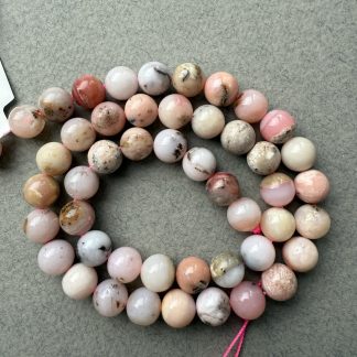 Намистини Рожевий Опал, форма гладка куля. 
.
Розмір 8 мм, довжина 39 см. 
.
Ціна 659 грни за нитку