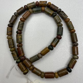 Намистини Яшма Пікассо, форма циліндр + рондель.
.
Розмір 6/10 мм, довжина 40 см. 
.
Ціна за нитку