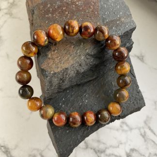 Браслет Пітерсит, форма куля, гладка.
Розмір намистини 8-9 мм, розмір 16 см обхвату.
Ціна за шт