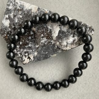Браслет Чорний турмалін, форма куля, гладка.
Розмір намистини 8мм, розмір 17см обхвату.
Ціна за шт