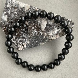 Браслет Чорний турмалін, форма куля, гладка.
Розмір намистини 8мм, розмір 17см обхвату.
Ціна за шт