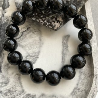 Браслет Чорний Агат, форма куля, гладка.
Розмір намистини 10мм, розмір 16см обхвату.
Ціна за шт.