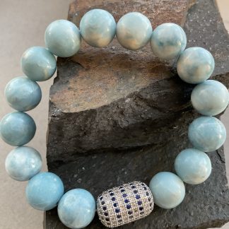 Браслет Ларімар, форма куля гладка з вставкою намистини.
Розмір намистини12мм, розмір 18см обхвату.
Ціна за шт.