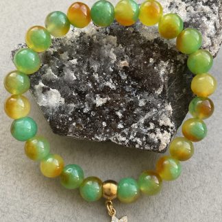 Браслет Агат, форма куля ,гладка з підвіскою.
Розмір намистин 8мм, розмір 16см обхвату.
Ціна за шт.