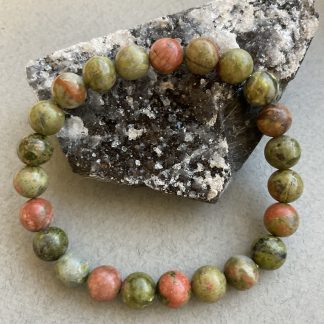 Браслет Яшма Унакіт, форма куля ,гладка .
Розмір намистини 9мм, розмір 17см обхвату.
Ціна за шт.