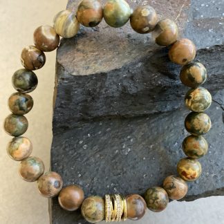 Браслет Яшма Реоліт, форма куля ,гладка з вставкою намистини.
Розмір намистини 8мм, розмір 16см обхвату.
Ціна за шт.