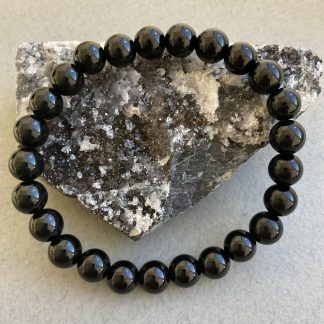 Браслет Чьорний Агат, форма куля ,гладка .
Розмір намистини 8мм, розмір 17см обхвату.
Ціна за шт.