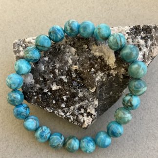 Браслет Південно- африканська бірюза, форма куля,гладка.
Розмір намистини 9мм, розмір 16см обхвату.
Ціна за шт.