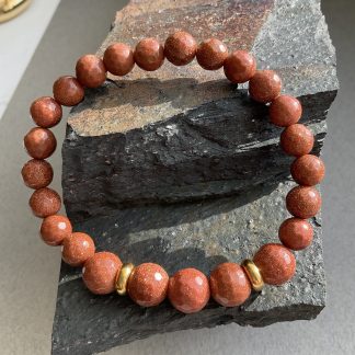 Браслет Авантюрин, форма кругла,гладка з вставкою намистин.
Розмір намистини 8мм, розмір17см обхвату.
Ціна за шт.