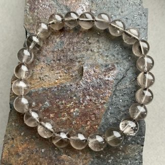 Браслет Димчатий Кварц, форма кругла,гладка.
Розмір намистини 8мм, розмір 16см обхвату.
Ціна за шт.