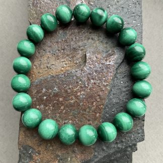 Браслет Малахіт, форма кругла, гладка.
Розмір намистини 10мм, розмір 18см обхвату.
Ціна за шт.