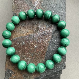 Браслет Малахіт, форма кругла,гладка.
Розмір намистини 10мм, розмір 17см обхвату.
Ціна за шт.