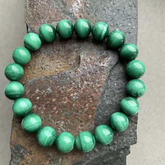 Браслет Малахіт, форма кругла,гладка.
Розмір намистини 10мм, розмір 17см обхвату.
Ціна за шт.