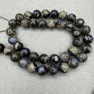 Намистини Опал Африканський сірий, форма гладка куля. Розмір 10 мм, довжина 39 см. 
Ціна  за нитку