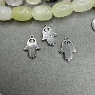 Підвіс Долоня Хамса, родування по латуні, відтінок нат золото
.
Розмір 16/12 мм 
.
Ціна за шт